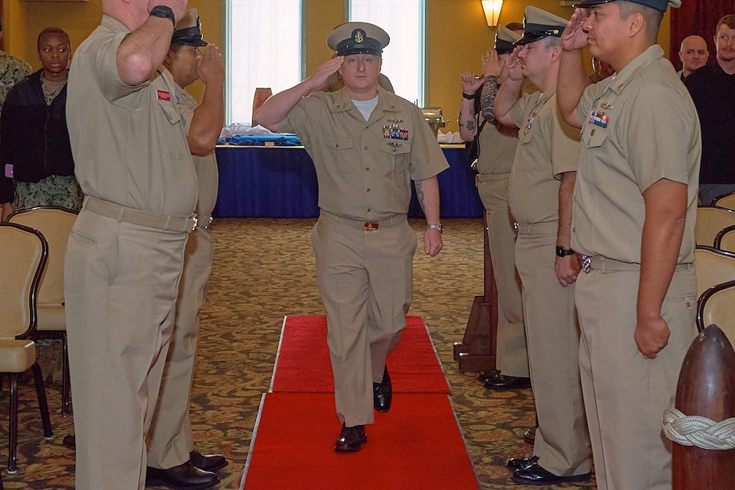 Sideboys render honors as Chief Information Systems Technician Kevin Smith arrives for his retirement ceremony at Commander, Fleet Activities Yokosuka’s (CFAY) CPO Club, Nov. 14, 2025.
