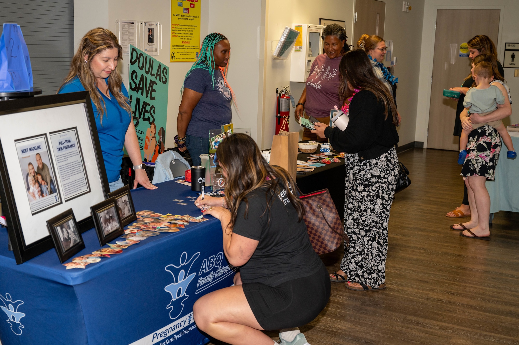 people at booths at resource fair