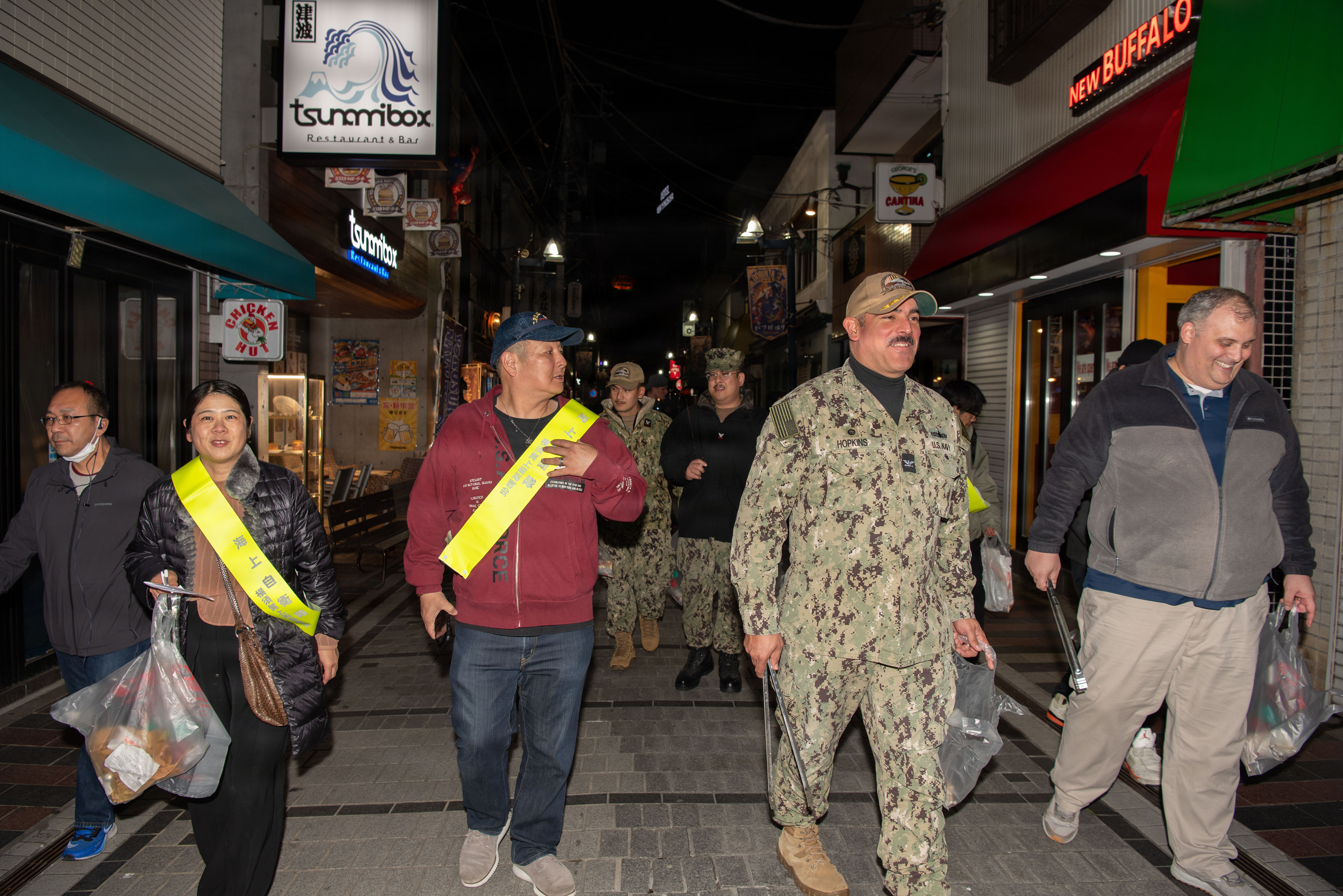 apt. John Hopkins, Commander, Fleet Activities Yokosuka (CFAY) , along with CFAY Sailors and tenant commands participated in street cleaning activities with host nation partners as part of a community relations program on November 21, 2025.