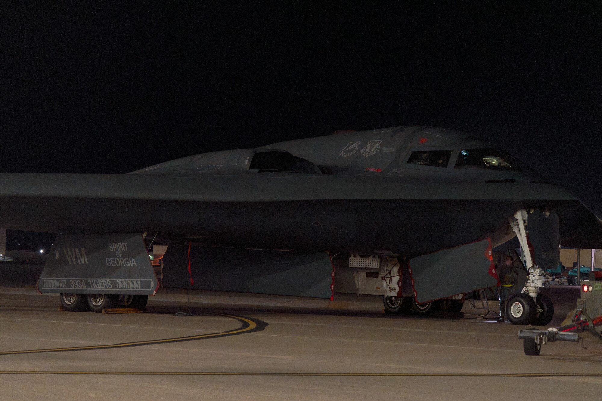 A U.S. Air Force B-2 Spirit, “Spirit of Georgia,” aircraft parks by a hangar at Whiteman Air Force Base, Missouri, Nov. 6th, 2025. The “Spirit of Georgia,” was damaged in an aircraft incident in September of 2021 and has recently returned to the fleet. (U.S. Air Force photo by Senior Airman Robert E. Hicks)