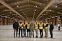 Some of the members of the Project Delivery Team from the U.S. Army Corps of Engineers – Far East District attending a ribbon cutting for the construction of the Airfield Damage Repair warehouse on Osan Air Base, South Korea, Dec. 3, 2025.
