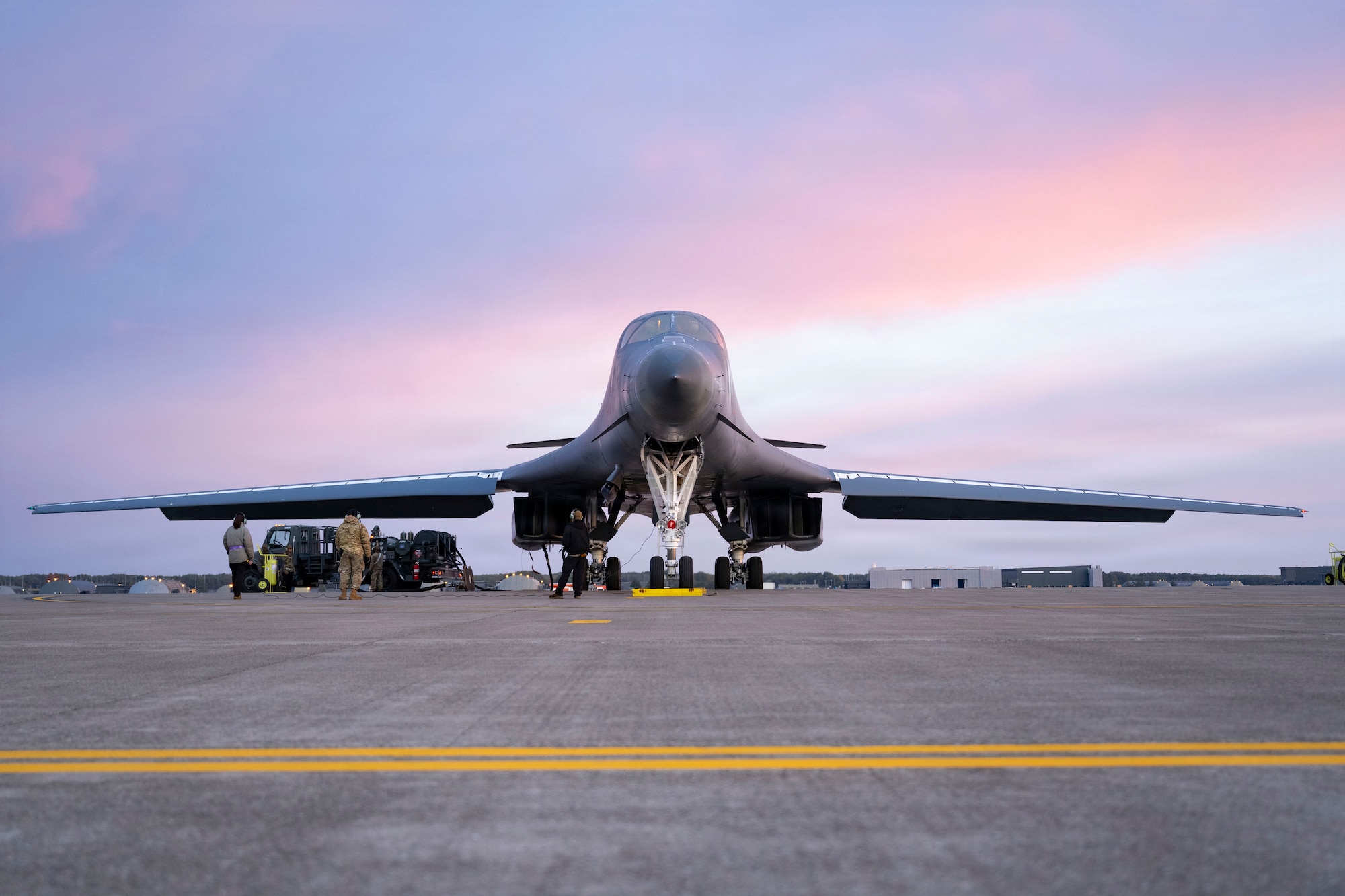 A U.S. Air Force B-1B Lancer gets hot pit refueled before its return to Dyess Air Force Base, Texas, at Misawa Air Base, Japan, Nov. 17, 2025, concluding a bomber task force deployment. BTF operations employ U.S. strategic bombers globally, deter adversaries, assure allies and partners, strengthen interoperability and maintain readiness and global strike capability. (U.S. Air Force photo by Senior Airman Emma Anderson)
