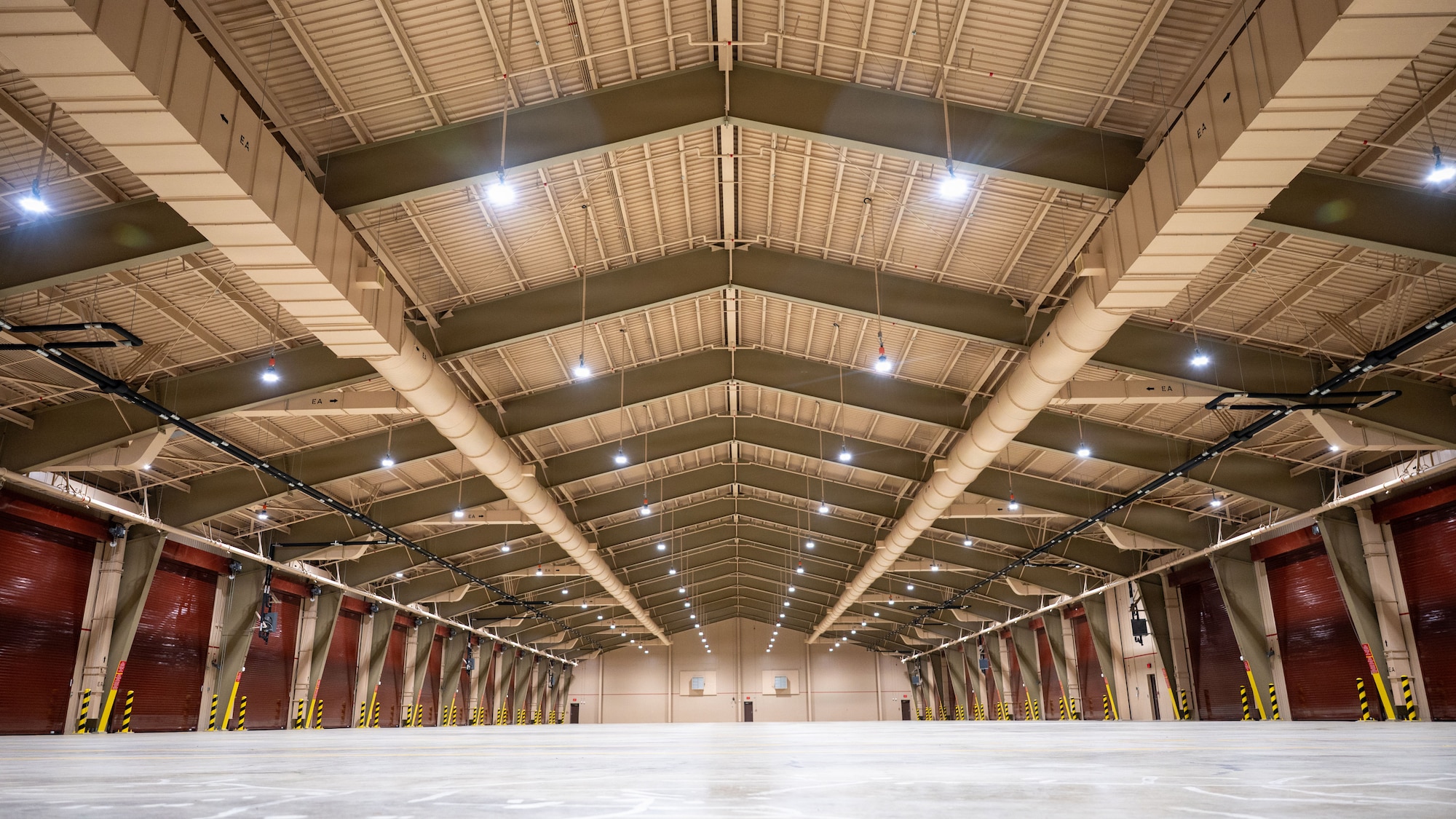 A newly constructed airfield damage recovery warehouse waits to store heavy equipment for the 51st Civil Engineer Squadron before a ribbon-cutting ceremony at Osan Air Base, Republic of Korea, December 3, 2025. The warehouse was paid for by ROK Funded Construction and will store pieces of heavy equipment vital to Team Osan’s airfield recovery program. (U.S. Air Force photo by Staff Sgt. Dustin Braaten)