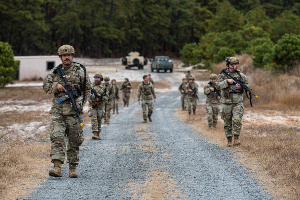 U.S. Air Force Airmen assigned to the 321st Contingency Response Squadron conduct dismounted patrol drills during the 321st CRS individual deployment training refresher at Joint Base McGuire-Dix-Lakehurst, Oct. 29, 2025. The IDT refresher requires all members to participate to ensure the entire unit is up-to-date on their required deployment readiness training for their upcoming alert cycle. (U.S. Air Force photo by Staff Sgt. Devin M. Rumbaugh)