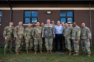 U.S. Airmen assigned to the 621st Contingency Response Wing pose with Mr. Alan Cleminson, Member of the British Empire, Royal Air Force Reserve warrant officer attached to the Joint Aircraft Recovery and Transportation Squadron, and European Union Crash Recovery Team, KUNZ Aero aircraft recovery instructor, after graduating from the International Civil Aviation Organization TRAINAIR Crash Recovery Manager Course Oct. 24, 2025 at Joint Base McGuire-Dix-Lakehurst, New Jersey. The 14 Airmen were the first Department of War members to attend the ICAO Crash Recovery Manager Course, enhancing operational capabilities and mission readiness. (U.S. Air Force photo by Staff Sgt. Devin M. Rumbaugh)