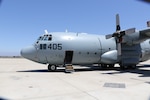 A KC-130T Hercules assigned to Air Test and Evaluation Squadron (VX) 30 sits on the tarmac at Naval Base Ventura County. The aircraft was used as a surrogate missile platform during Exercise Talisman Sabre 2025, supporting the U.S. Army’s first overseas launch of the Typhon missile system.