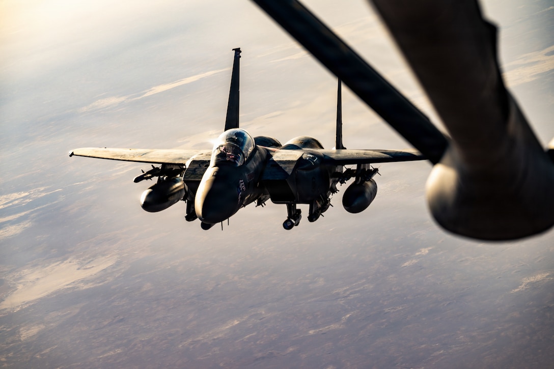 A U.S. Air Force F-15E Strike Eagle aircraft assigned to the 391st Expeditionary Fighter Squadron, prepares to receive fuel from a KC-135T Stratotanker aircraft during a mission supporting U.S. and coalition operations in the U.S. Central Command area of responsibility, Oct. 11, 2025. The F-15E provides U.S. and coalition forces with a dominant tactical edge, capable of striking strategic targets deep within contested environments. (U.S. Air Force photo by Staff Sgt. Kristen Heller)