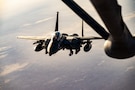 A U.S. Air Force F-15E Strike Eagle aircraft assigned to the 391st Expeditionary Fighter Squadron, prepares to receive fuel from a KC-135T Stratotanker aircraft during a mission supporting U.S. and coalition operations in the U.S. Central Command area of responsibility, Oct. 11, 2025. The F-15E provides U.S. and coalition forces with a dominant tactical edge, capable of striking strategic targets deep within contested environments. (U.S. Air Force photo by Staff Sgt. Kristen Heller)
