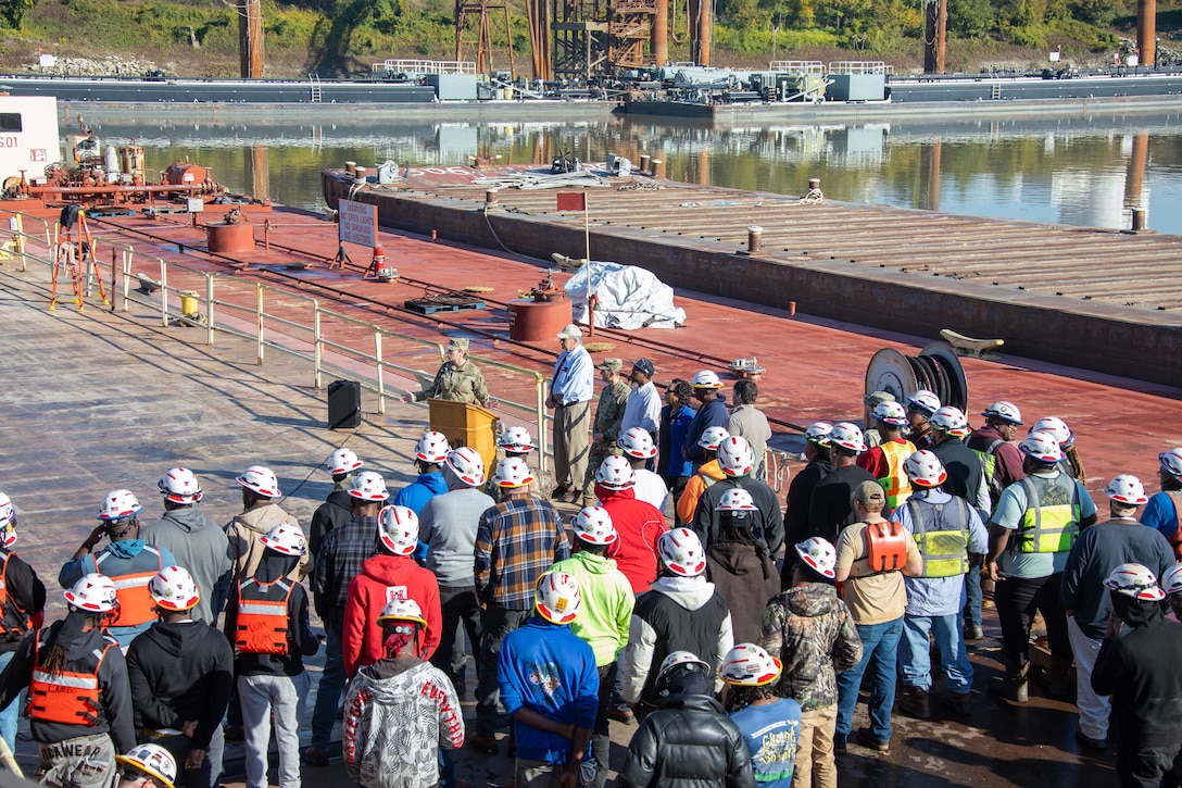 Crews of the Mat Sinking Unit are lined up and preparing for the revetment season kick off with a blessing of the fleet ceremony on Nov. 6, 2025.