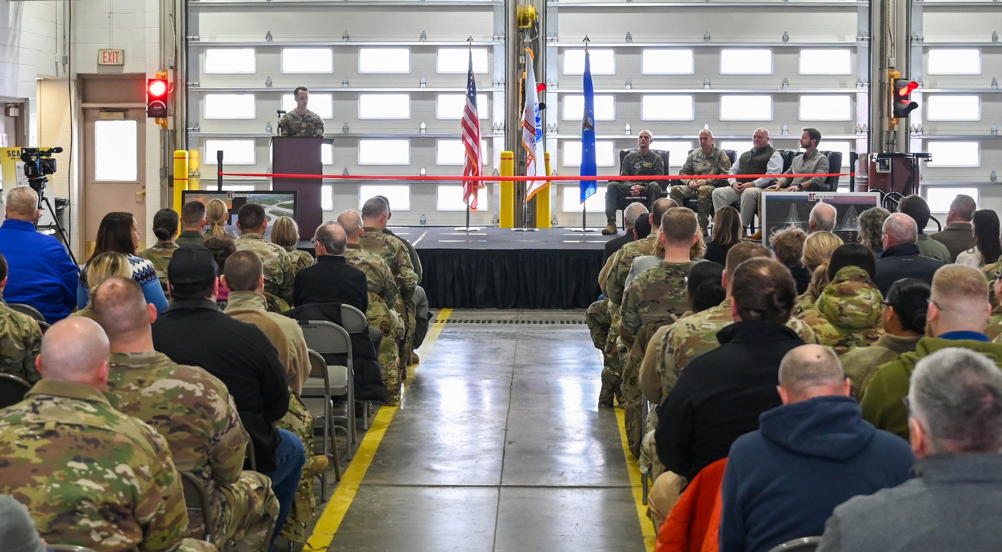 U.S. Air Force Staff Sgt. Hayden Newmiller, 28th Communication Squadron network and server administration journeyman, narrates a ribbon cutting ceremony at Ellsworth Air Force Base, S.D., Dec. 3, 2025.