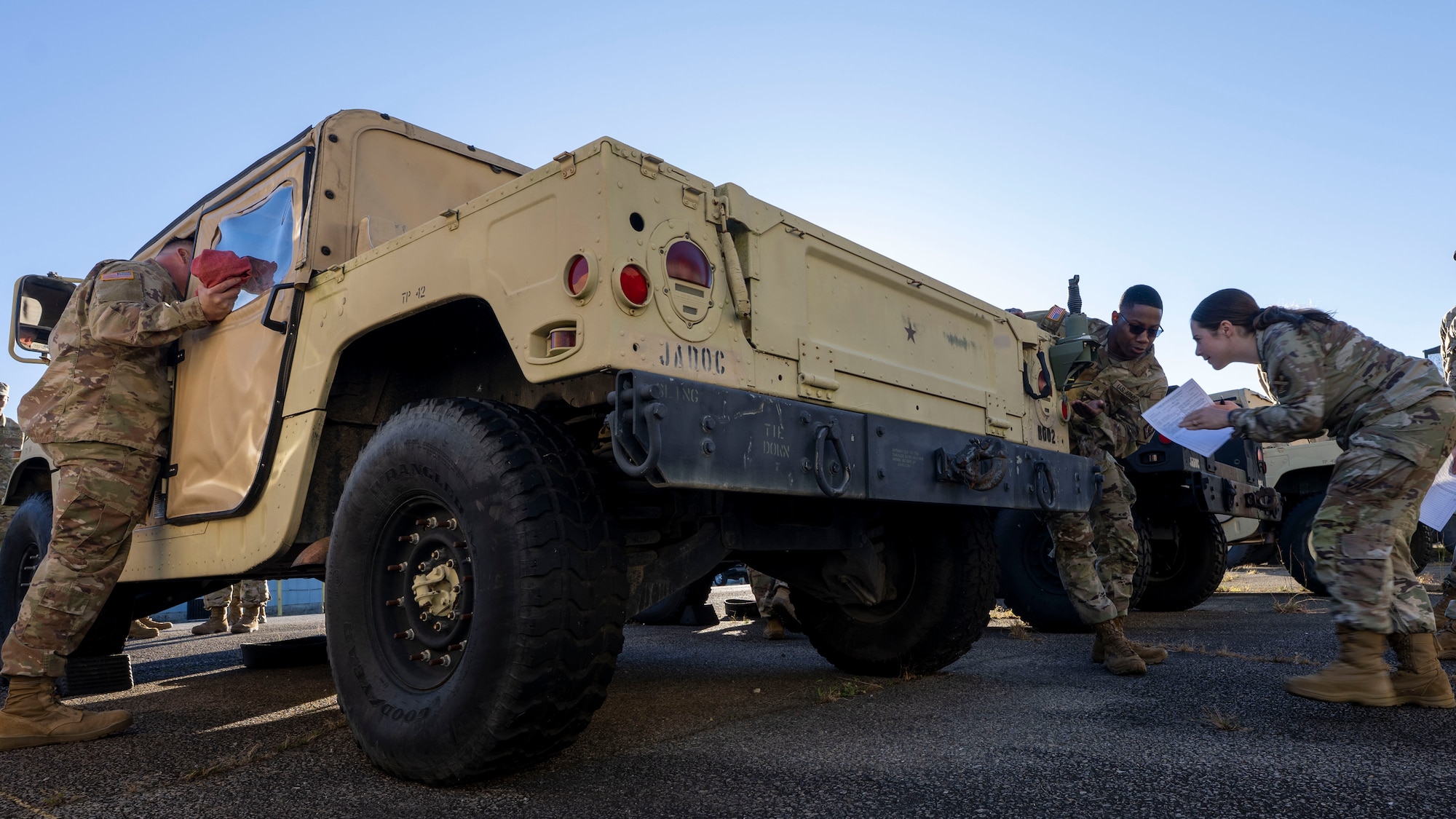 U.S. Army Soldiers assigned to the 1st Battalion, 204th Air Defense Artillery Regiment, Mississippi National Guard, instruct U.S. Air Force Airmen assigned to the 11th Civil Engineer Squadron on vehicle inspections at Fort Belvoir, Va., Oct. 16, 2025.