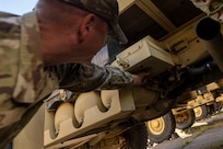 U.S. Air Force Chief Master Sgt. Justin S. Cruz, senior enlisted leader for the 11th Civil Engineer Squadron, inspects a medium tactical vehicle at Fort Belvoir, Va., Oct. 16, 2025.