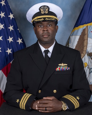 Commander Muzik M. McClinton
