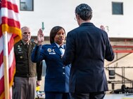 U.S. Air Force Lt. Gen. (Ret.) Marc H. Sasseville, right, administers the oath of office to Brig. Gen. Natasha S. Taylor, director of the Joint Staff, Joint Force Headquarters, on Joint Base Andrews, Maryland, Dec. 3, 2025, at a ceremony formally promoting Taylor to her rank. In this role, she is responsible for overseeing and managing the development, execution, and evaluation of joint staff programs and policies pertaining to the command, control, and operation of joint functions within the District of Columbia Army and District of Columbia Air National Guard. She manages readiness of joint defense programs to include the Civil Support Team, Homeland Response Force, State Partnership Program, Counter Drug Task Force, and Defense Support to Civil Authorities. (U.S. Air National Guard photo by Tech. Sgt. Andrew Enriquez)