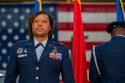 Brig. Gen. Natasha S. Taylor, director of the Joint Staff, Joint Force Headquarters, District of Columbia National Guard, stands at attention as her personal colors are posted during a ceremony formally promoting her to the rank on Joint Base Andrews, Maryland, Dec. 3, 2025. In this role, she is responsible for overseeing and managing the development, execution, and evaluation of joint staff programs and policies pertaining to the command, control, and operation of joint functions within the District of Columbia Army and District of Columbia Air National Guard. She manages readiness of joint defense programs to include the Civil Support Team, Homeland Response Force, State Partnership Program, Counter Drug Task Force, and Defense Support to Civil Authorities. (U.S. Air National Guard photo by Tech. Sgt. Andrew Enriquez)