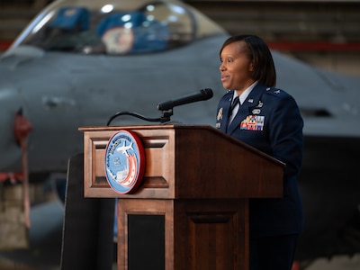 Brig. Gen. Natasha S. Taylor, director of the Joint Staff, Joint Force Headquarters, District of Columbia National Guard, speaks to attendees at a ceremony formally promoting her to the rank on Joint Base Andrews, Dec. 3, 2025. In this role, she is responsible for overseeing and managing the development, execution, and evaluation of joint staff programs and policies pertaining to the command, control, and operation of joint functions within the District of Columbia Army and District of Columbia Air National Guard. She manages readiness of joint defense programs to include the Civil Support Team, Homeland Response Force, State Partnership Program, Counter Drug Task Force, and Defense Support to Civil Authorities. (U.S. Air National Guard photo by Tech. Sgt. Andrew Enriquez)