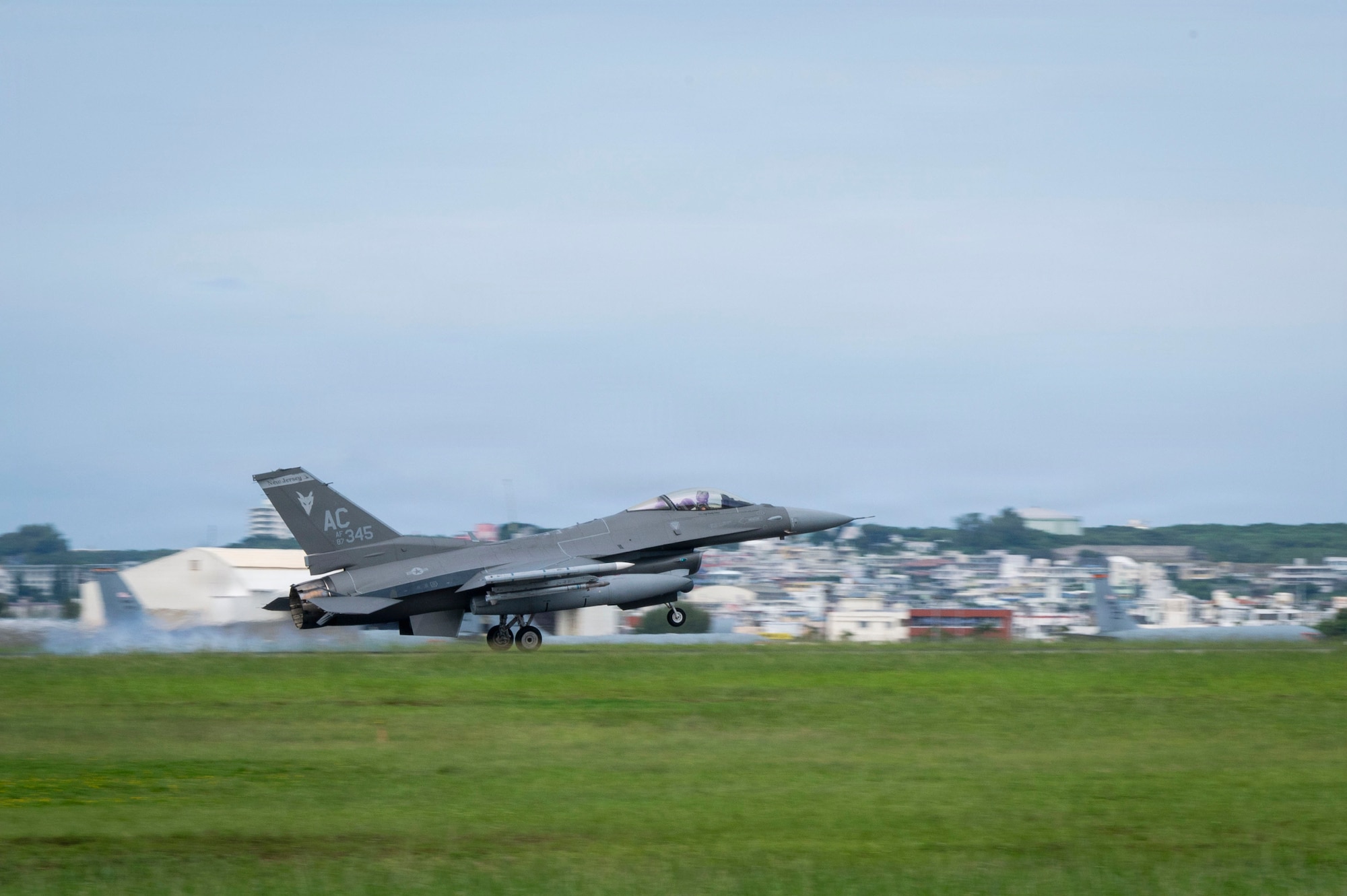 A U.S. Air Force F-16C Fighting Falcon assigned to the 119th Expeditionary Fighter Squadron, Atlantic City Air National Guard Base, New Jersey, lands at Kadena Air Base, Japan, Oct. 23, 2025.