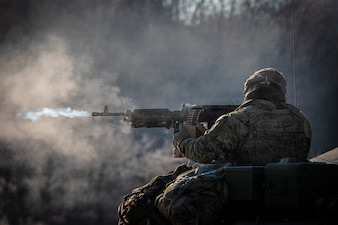 U.S. Army Staff Sgt. Zhiyuan Jiang, section chief, B Battery, 6-37 Field Artillery Regiment, 210 Field Artillery Brigade, fires 240B machine gun during a live fire exercise at Montana Range near Paju, South Korea, Nov. 4, 2025.