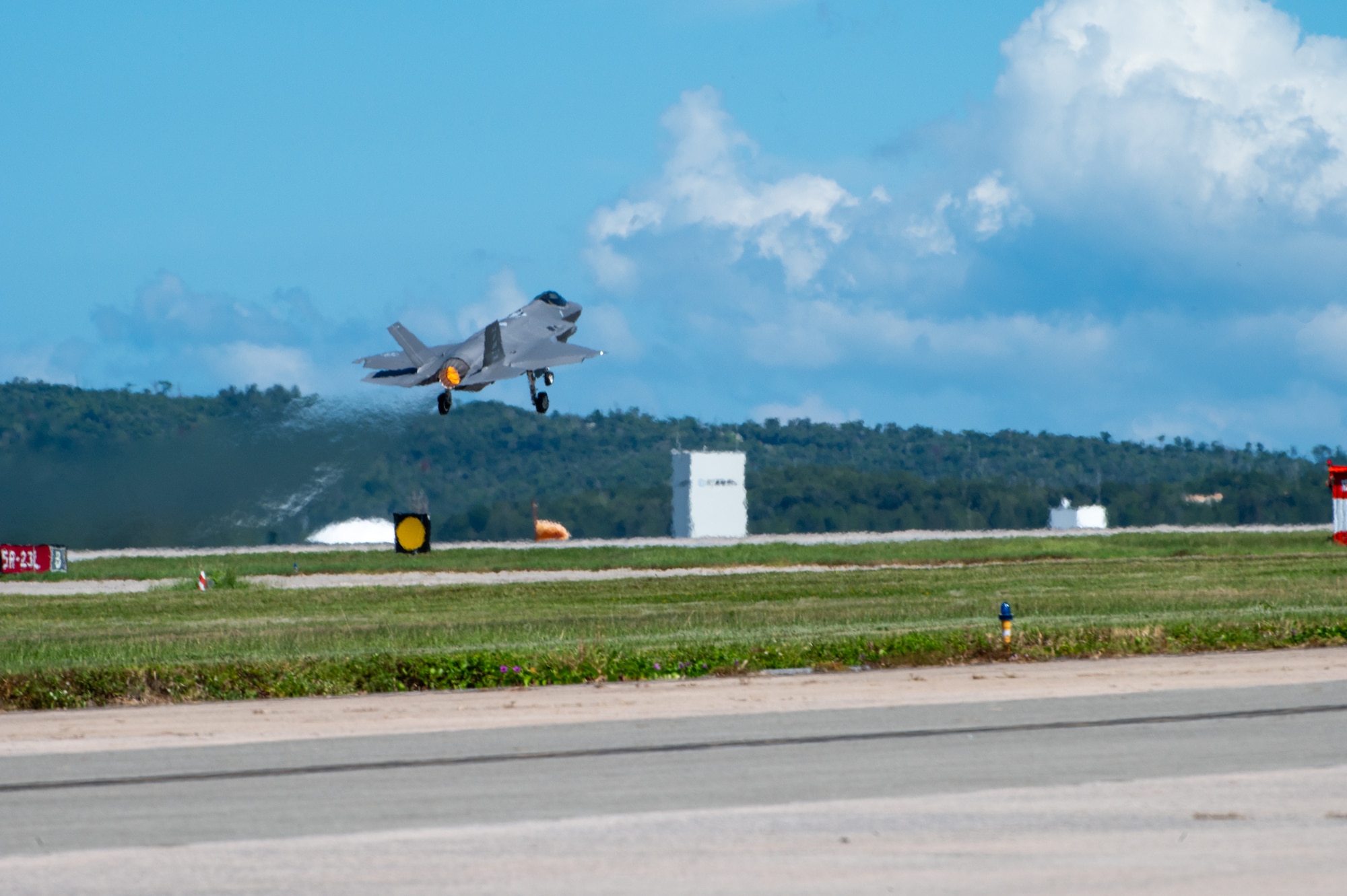 A U.S. Air Force F-35A Lightning II assigned to the 356th Expeditionary Fighter Squadron, deployed to Kadena Air Base, performs a touch and go at Kadena Air Base, Japan, Oct. 2, 2025.