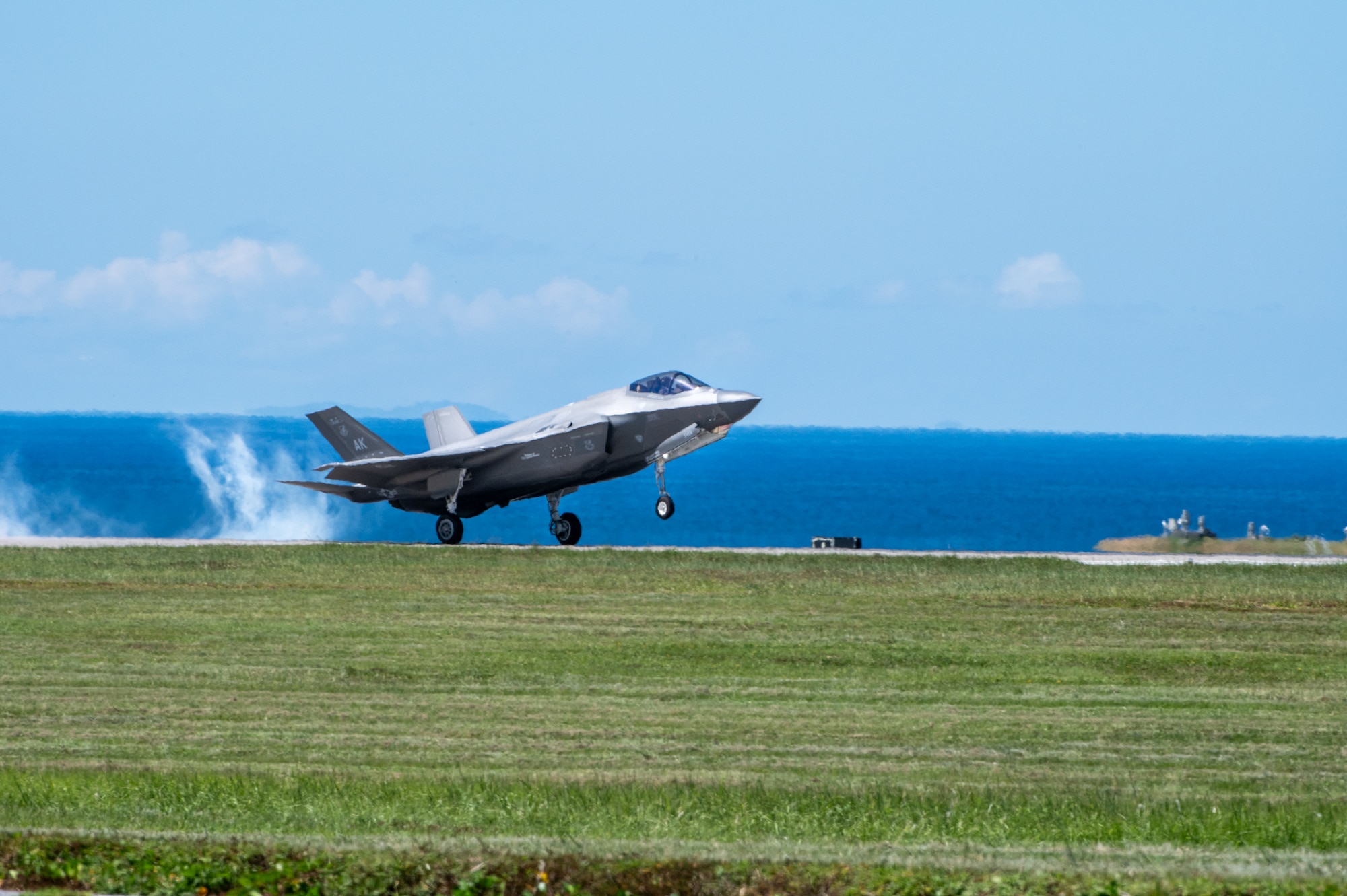 A U.S. Air Force F-35A Lightning II assigned to the 356th Expeditionary Fighter Squadron, deployed to Kadena Air Base, performs a touch and go at Kadena Air Base, Japan, Oct. 2, 2025.