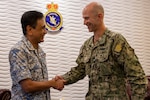 U.S. Navy Capt. Matth Cox, deputy commodore, Destroyer Squadron (DESRON) 7,shakes hands with Royal Malaysian Navy (RMN) Western Fleet Commander, Vice Adm. Dato’ Baharudin bin Wan Md Nor, during an office call during Cooperation Afloat Readiness and Training (CARAT) Malaysia 2025 at Lumut Naval Base, in Lumut, Malaysia, Dec. 4, 2025.This year marks the 31st iteration of CARAT, a multinational exercise series designed to enhance U.S. and partner navies' abilities to operate together in response to traditional and nontraditional maritime security challenges in the Indo-Pacific region. (U.S. Navy photo by Mass Communication Specialist 2nd Class Anthony Robledo)
