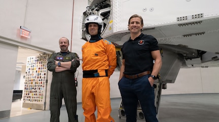 From left: Patrick Edwards and Mike Greene, flight surgeons with the Canadian Space Agency (CSA), and CSA astronaut Joshua Kutryk stand in front of the 711th Human Performance Wing’s centrifuge at Wright-Patterson Air Force Base, Ohio, June 20, 2025. Kutryk was one of five astronauts from NASA, CSA and the European Space Agency who completed centrifuge training, which simulates gravitational forces, or g-forces, experienced during launch and return to Earth. (U.S. Air Force photo / Keith Lewis)