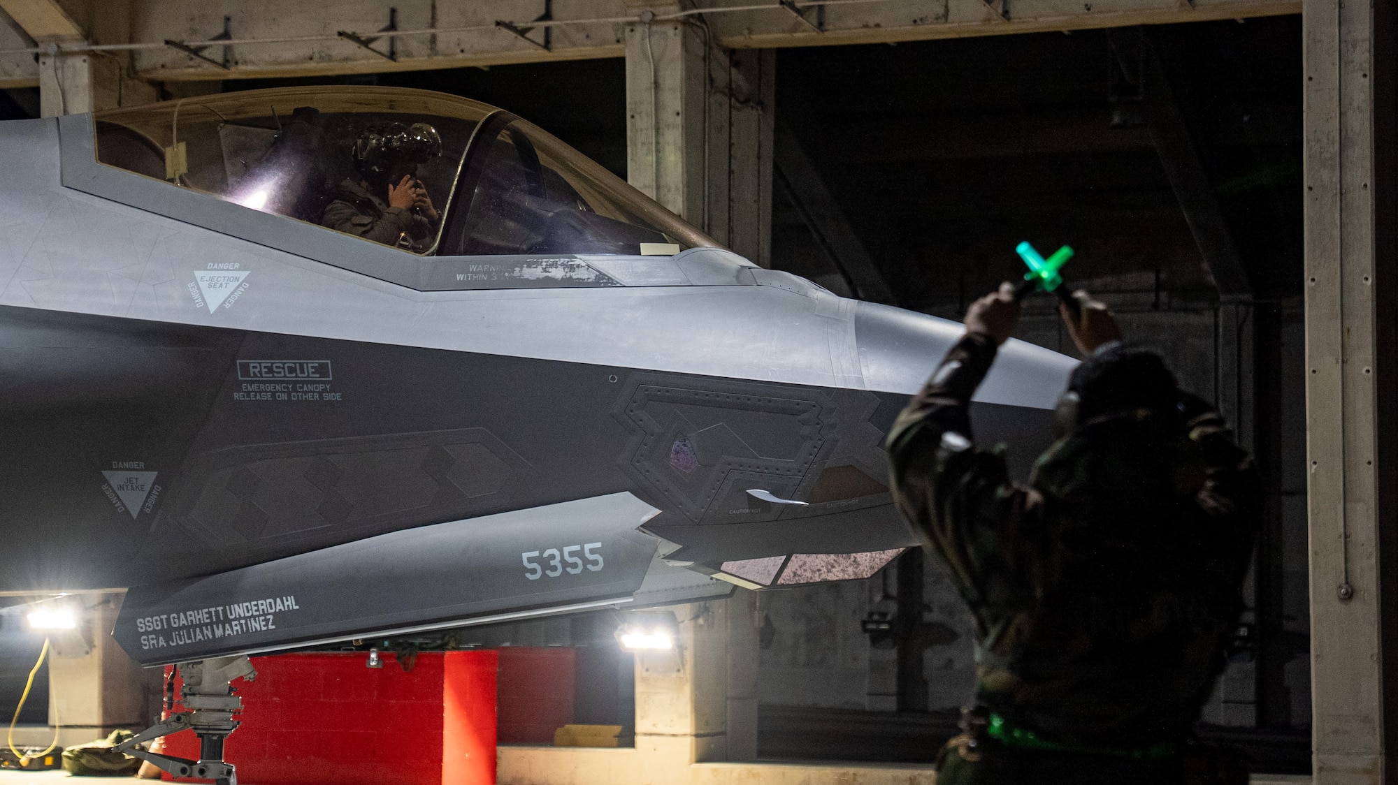 An F-35 departs a parking spot.