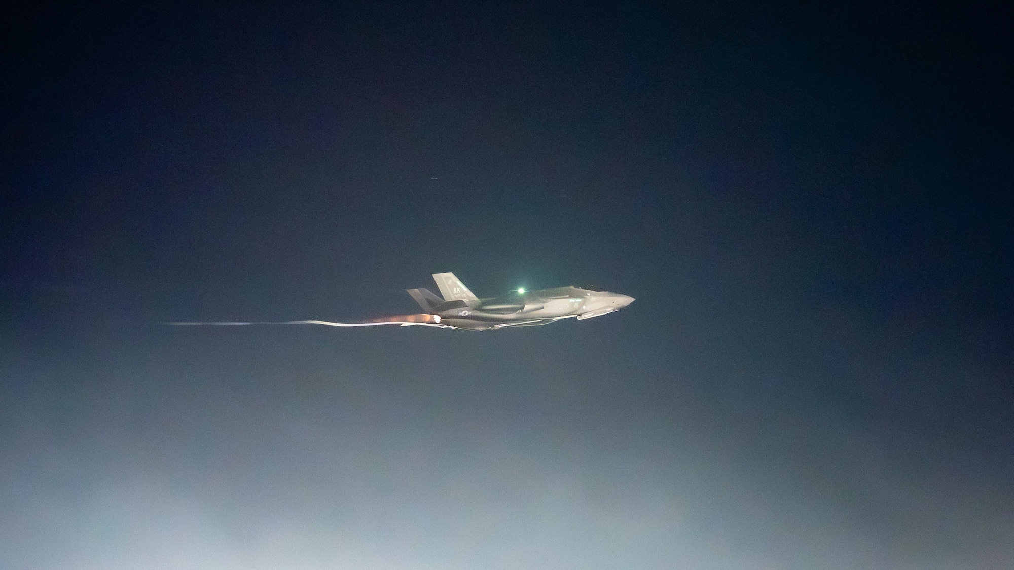 An F-35 takes flight from a runway