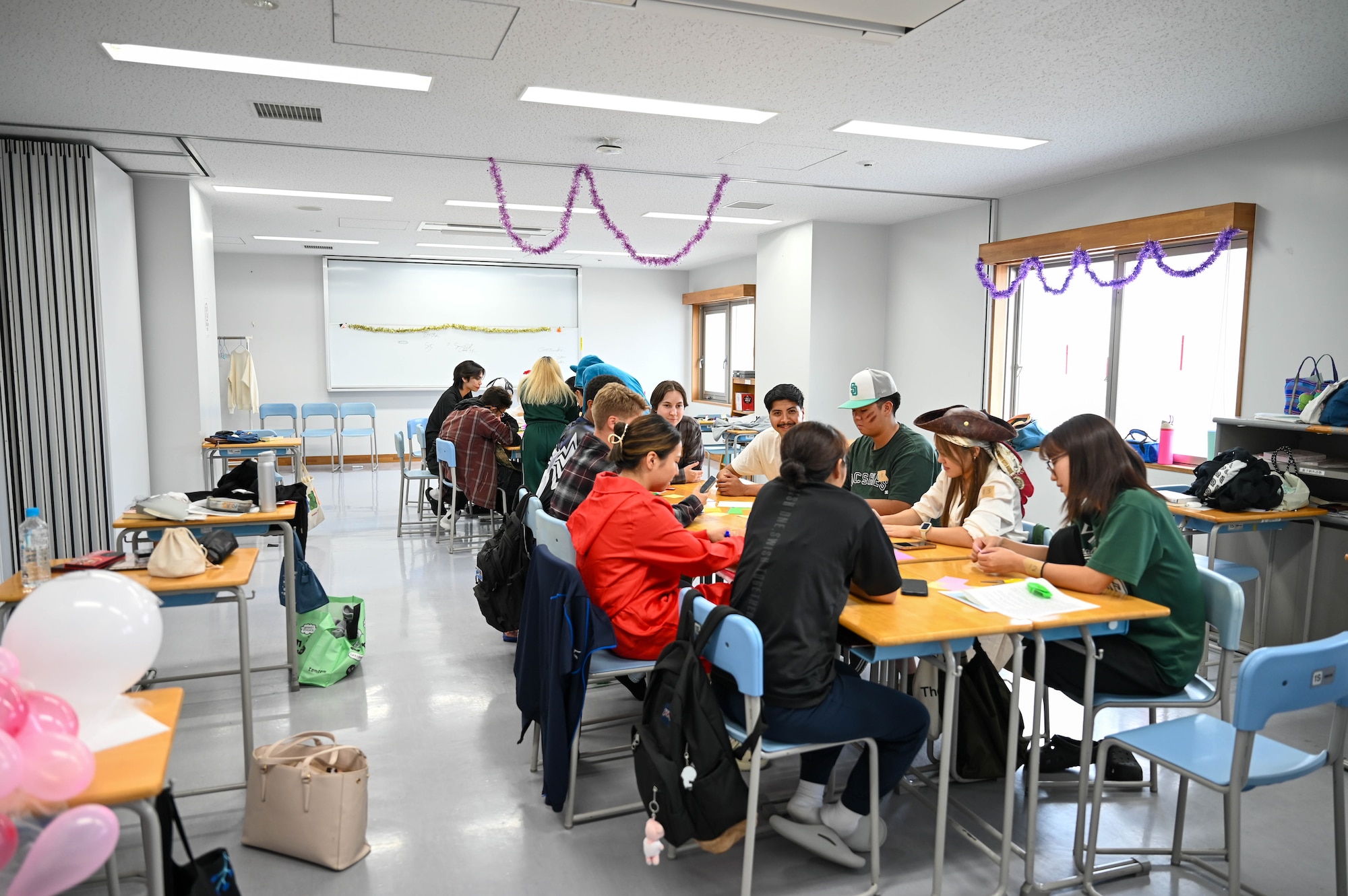 Service members and locals playing games.