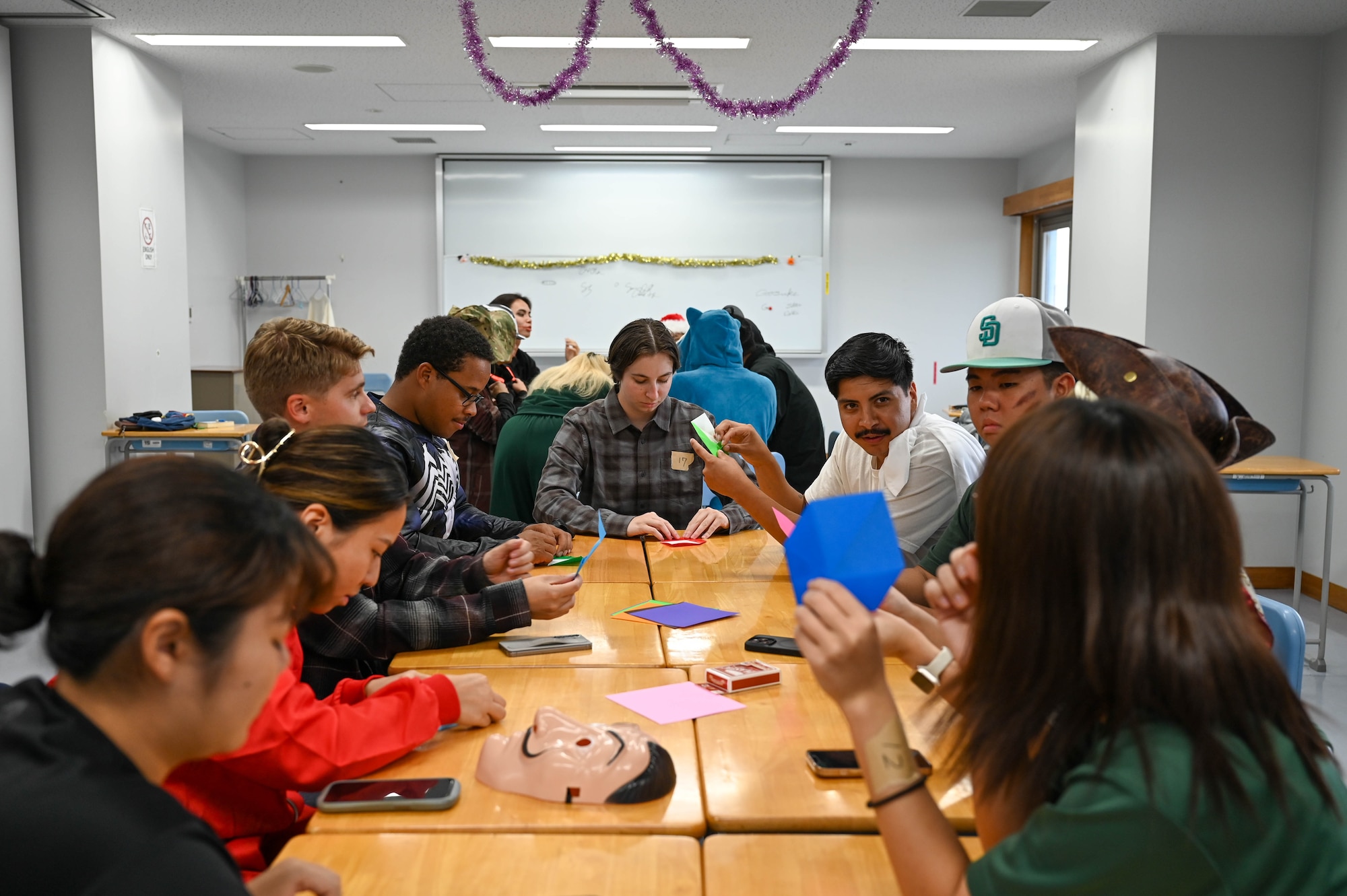 Service members and locals plating games.