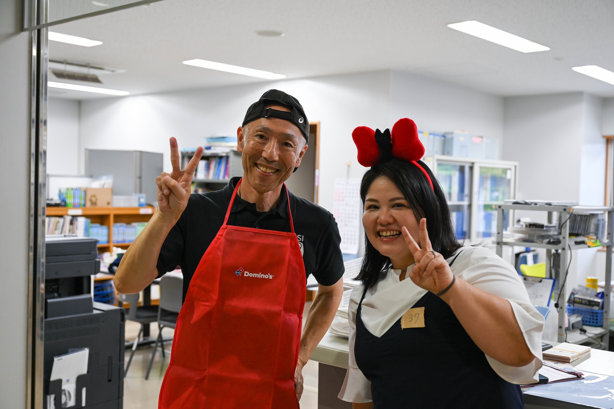 Two locals posing for photo.