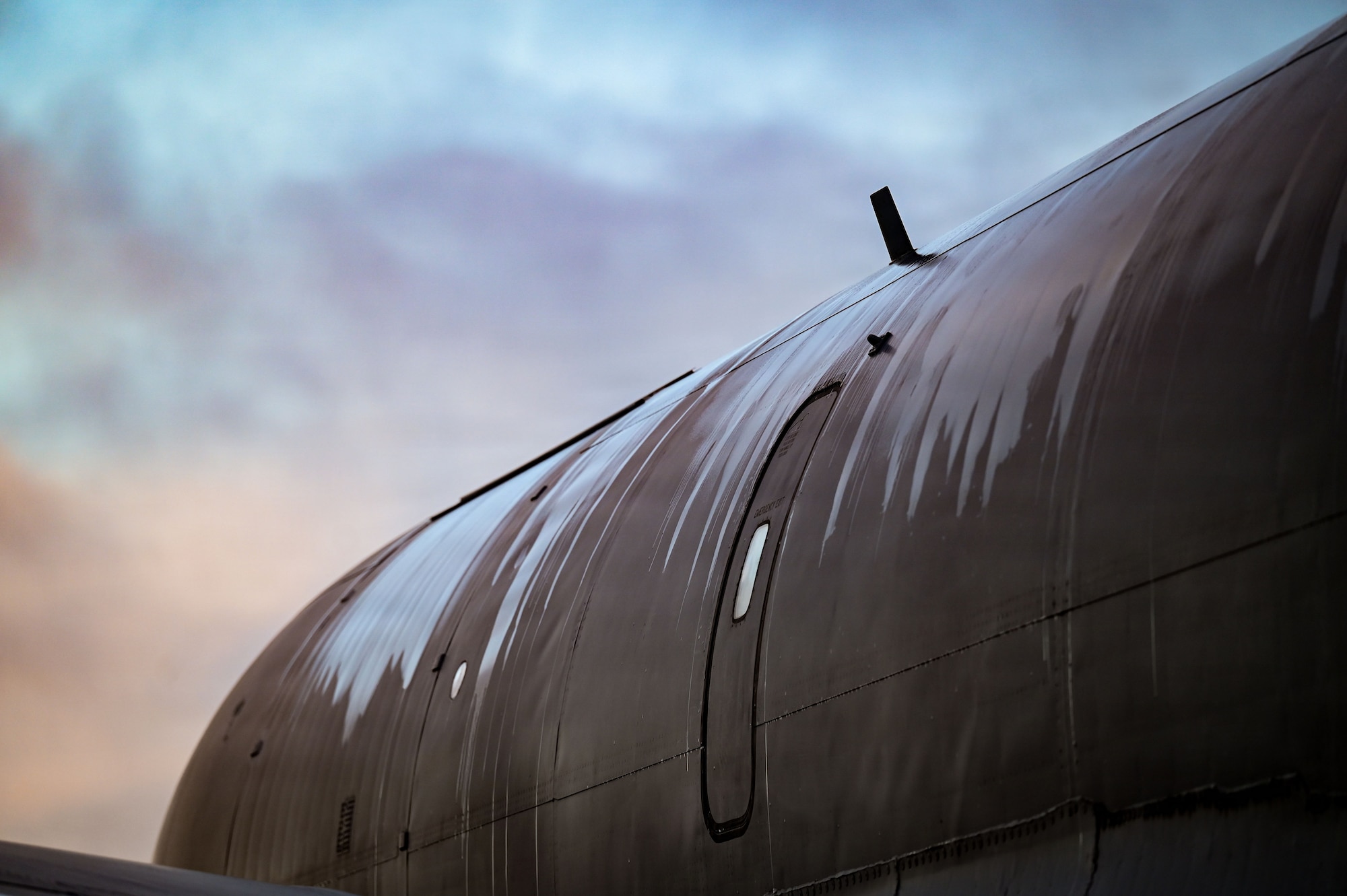 The sunrise hits the side of a KC-135 Stratotanker assigned to the 100th Air Refueling Wing prior to an air refueling mission at RAF Mildenhall, England, Oct. 15, 2025.