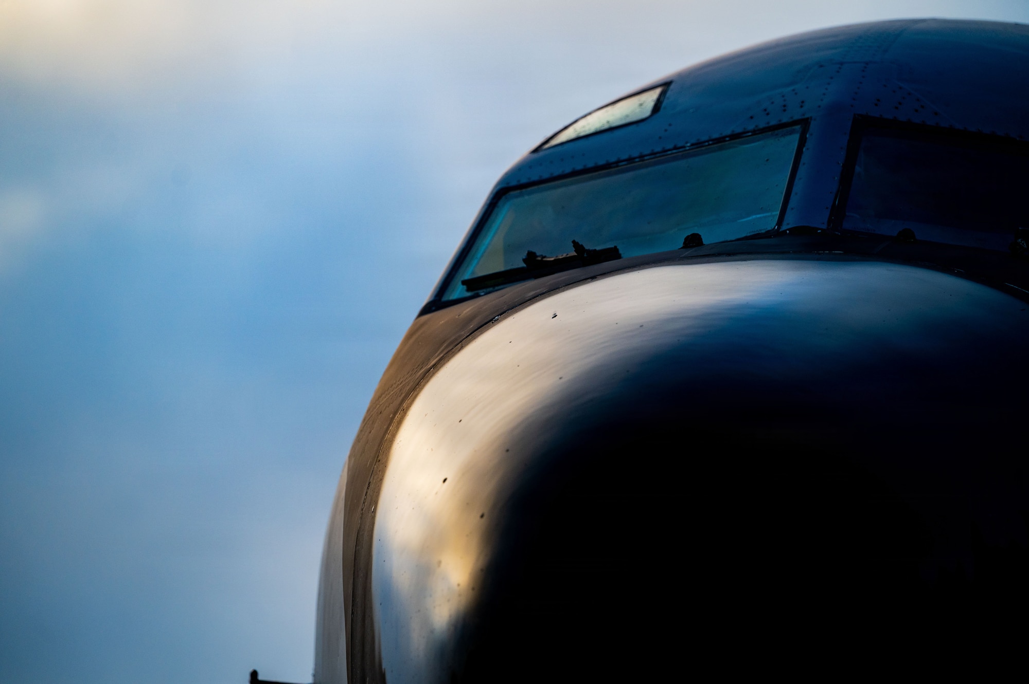 The sunrise hits the nose of a KC-135 Stratotanker assigned to the 100th Air Refueling Wing prior to an air refueling mission at RAF Mildenhall, England, Oct. 15, 2025.