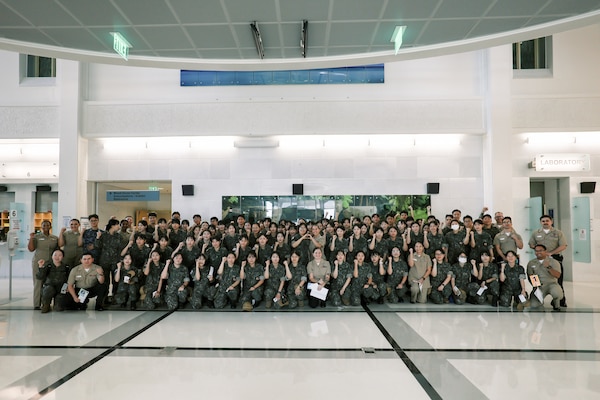 Republic of Korea (ROK) Military Nursing Academy cadets pose for a photo with their U.S. Navy counterparts at U.S. Naval Hospital Guam, Nov. 14, 2025. The cadets were participants in the Joint Cruise Training Task Group, which includes the island of Guam as one of their training stops.