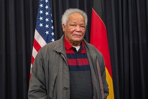 Local national awarded at the Length of Service ceremony.