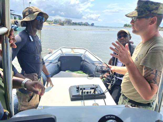 Engineering Aid 1st Class Dylan Maznicki, assigned to 22nd Naval Construction Regiment (22NCR), conducts topographic and bathymetric surveys during a joint maritime infrastructure assessment with the Gabonese Navy.