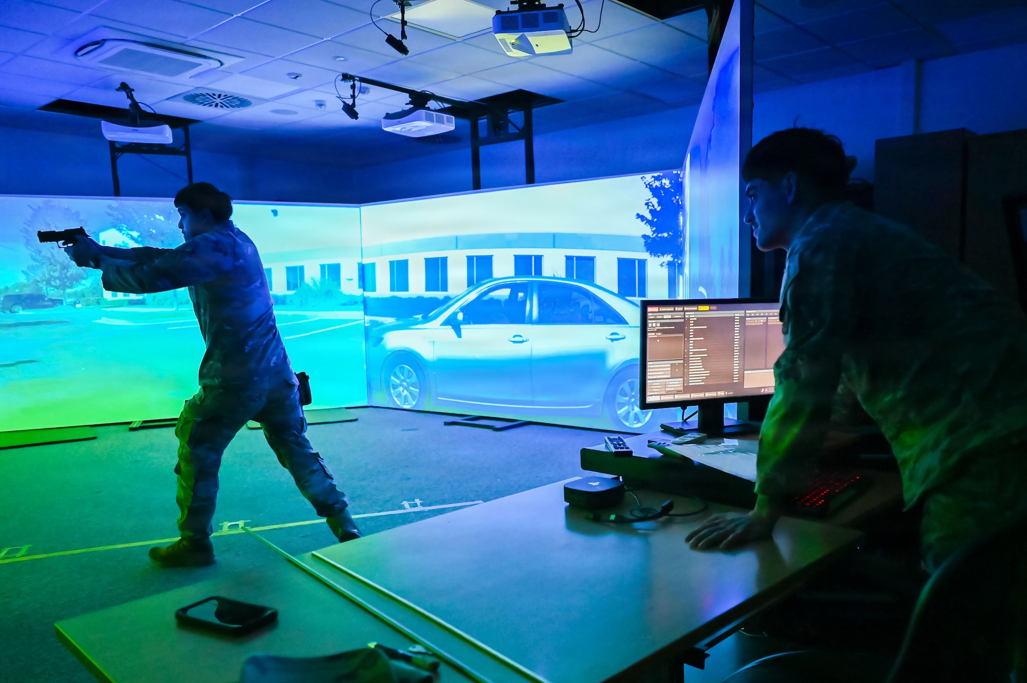 U.S. Air Force Senior Airman Alexandro Ochoa, right, 86th Security Forces training instructor, and Airman 1st Class Armando Suarez, 86th Security Forces member, practice verbal judo at Ramstein Air Base, Germany, Nov. 25, 2025.