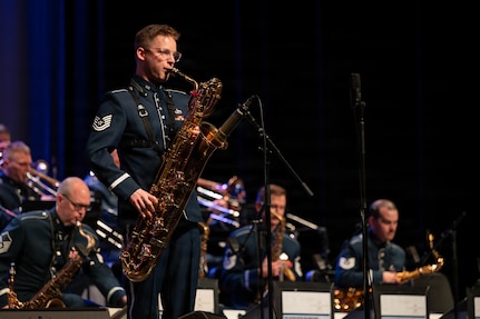 Airman playing saxophone