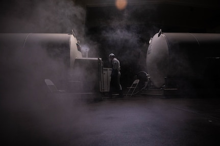 Airman checking tanks