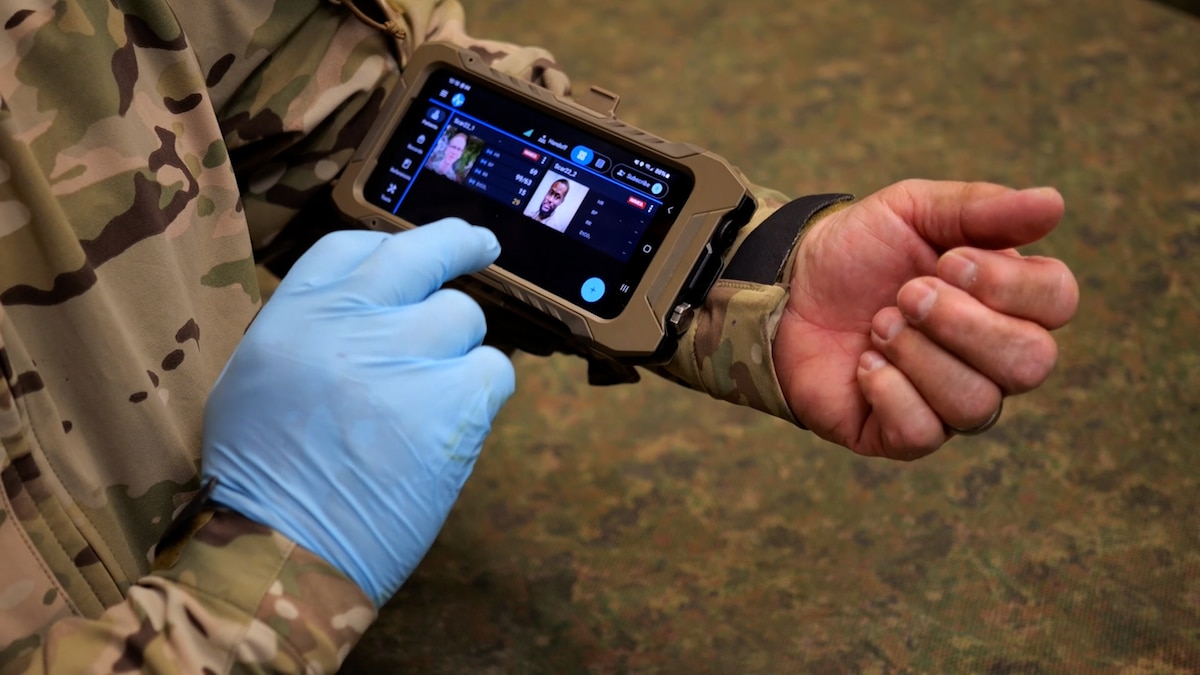 Image of an Airman using technology.