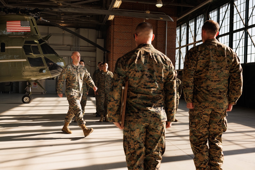 U.S. Marine Corps Gunnery Sgt. Conner Levinsky, the assistant chief of logistics with Marine Corps Air Facility, marches during his award ceremony at MCAF on Marine Corps Base Quantico, Virginia, Dec. 3, 2025. Levinsky received the “USMC Fire Service Instructor of the Year” award recognizing his exceptional teaching abilities, his impact on student performance, and his contributions to the Marine Corps fire service community. (U.S. Marine Corps photo by Lance Cpl. Harleigh Faulk)