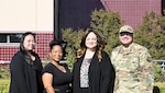 (From left) Valerie Roldan, Regina Barlow, Constance Smith, and Col. (Dr.) John Allis pose for a group photo outside David Grant Medical Center at Travis Air Force Base, California, Dec. 2, 2025. Roldan and Barlow are registered nurses and surgical clinical reviewers. Smith serves as the Lead Surgical Clinical Nurse Reviewer for the Air Force and represents the Air Force on the DoD DHA NSQIP Steering Panel. Allis is an orthopedic surgeon assigned to the 60th Medical Group.