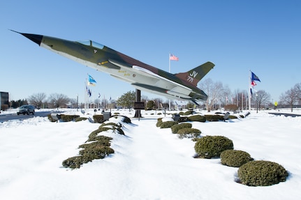 A familiar site at Joint Base Anacostia-Bolling (JBAB) is the Republic F-105D Thunderchief, located in front of Arnold Gate is surrounded by a field of snow Feb. 14, 2014 following a winter storm two days prior.