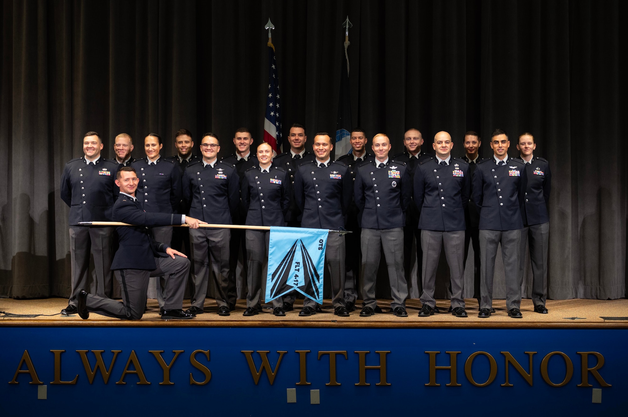 U.S. Space Force officer trainees wear their new service dress for a class photo in preparation for Officer Training School graduation at Maxwell Air Force Base, Alabama, Dec. 4, 2025. The dawn of a new era in military service unfolds as the first newly commissioned U.S. Space Force Guardians to wear the service’s new dress uniforms graduated from OTS, symbolizing a significant milestone in the evolution of the U.S. Space Force.