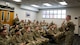 Chief Bickley speaks to a classroom full of Airmen attending Airman Leadership School.