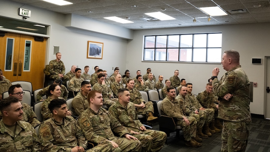Chief Bickley speaks to a classroom full of Airmen attending Airman Leadership School.