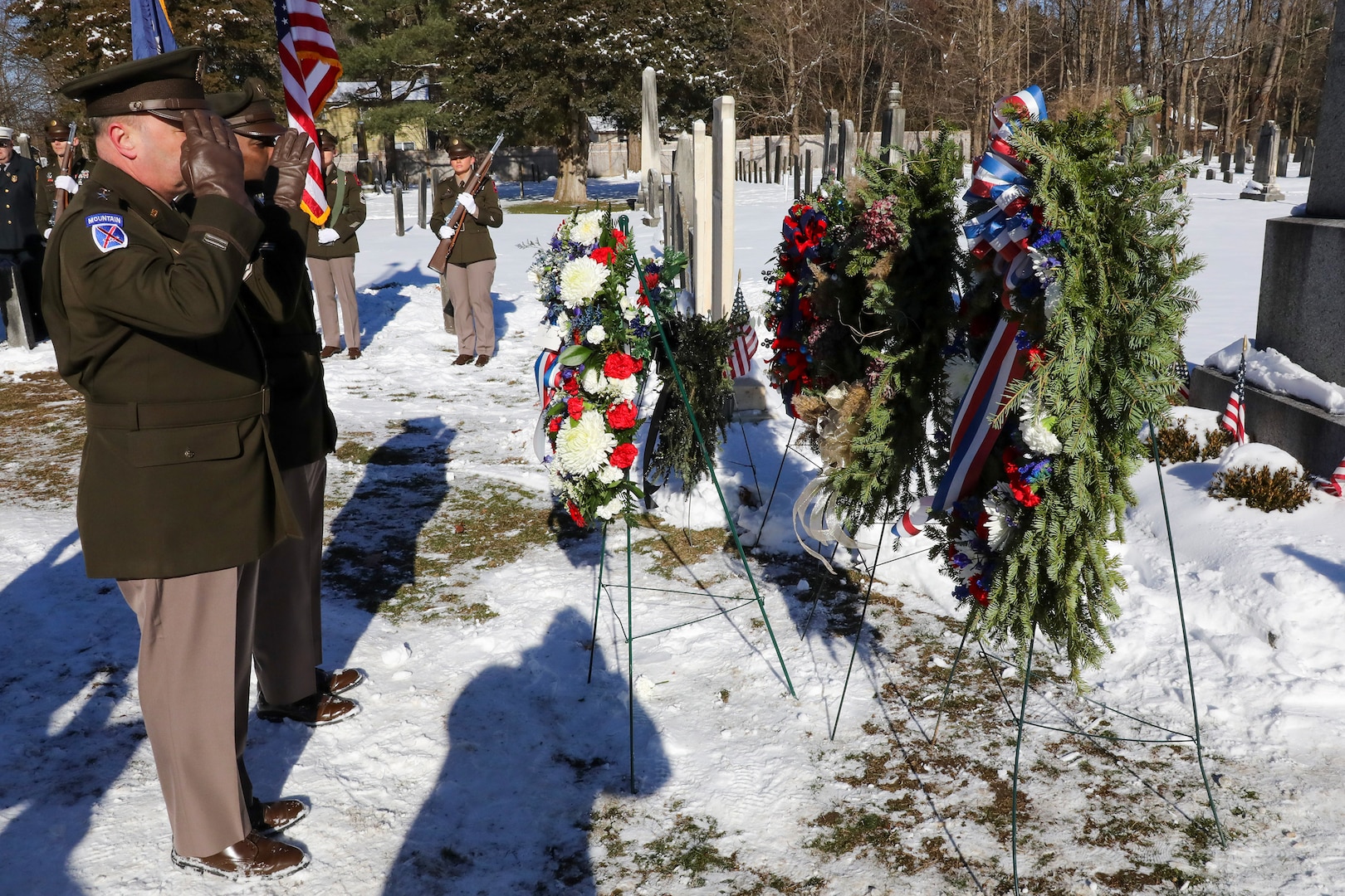 New York Army National Guard Maj. Gen. Michel Natali, assistant adjutant general, Army, and Command Sgt. Maj. Leylan Jones, salute after the placing a wreath from the White House during the annual wreath laying ceremony marking the birthday of President Martin Van Buren in Kinderhook, New York, on Dec. 5, 2025.