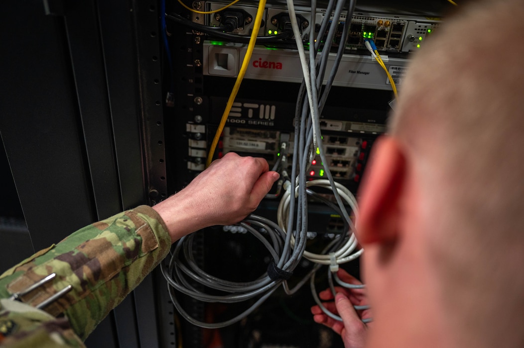 U.S. Air Force Airman 1st Class Dominic Puzzo, 56th Communications Squadron network systems operation technician, performs maintenance on a server, Oct. 1, 2025, at Luke Air Force Base, Arizona.
