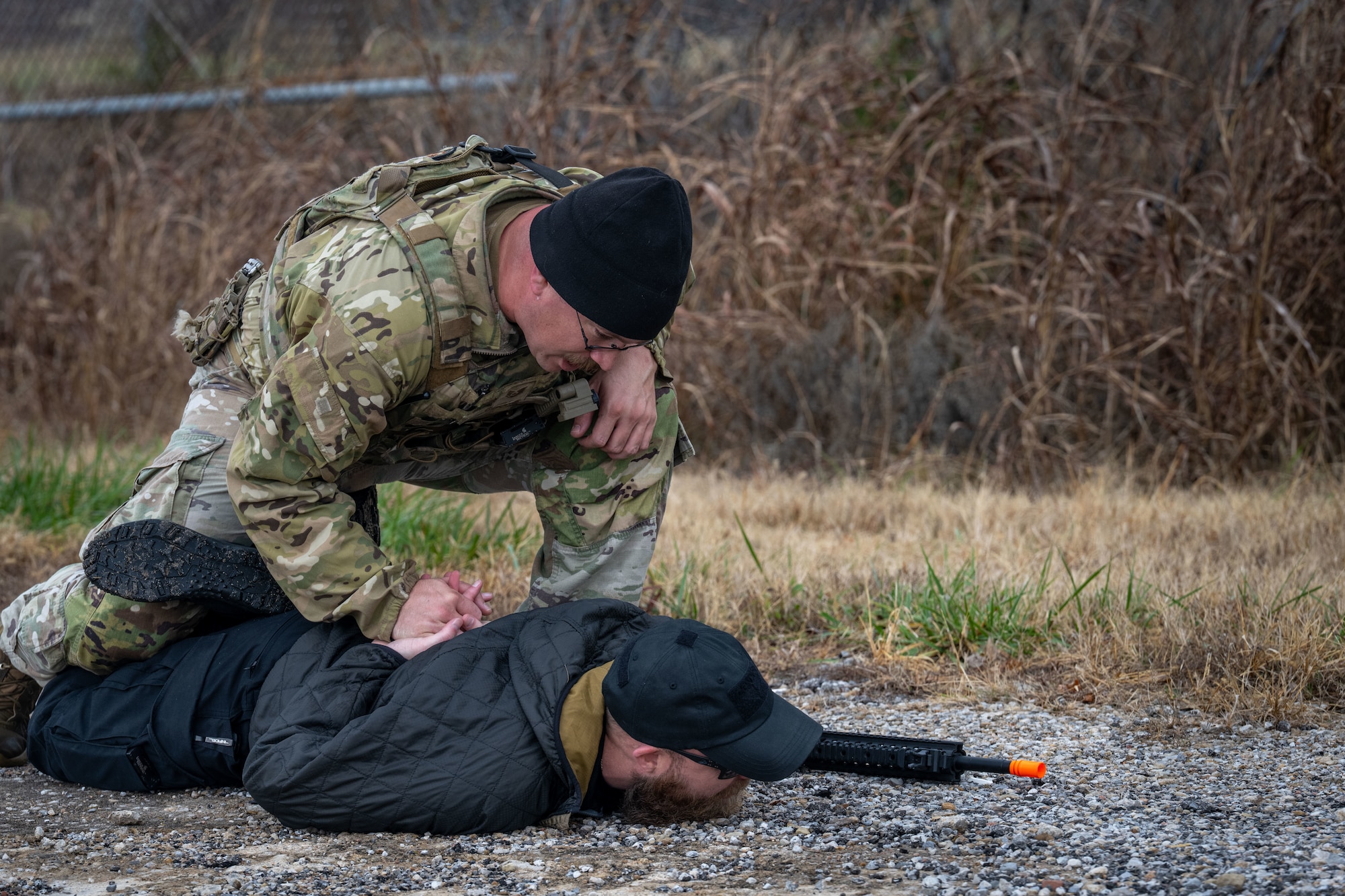 McConnell Air Force Base, Kansas, Nov. 21, 2025. Defenders hit Mount Village, a simulated urban location, for a week consisting of casualty care training, team movement, combatives, and close quarters battles during realistic scenarios. (U.S. Air Force photo by Senior Airman Paula Arce)
