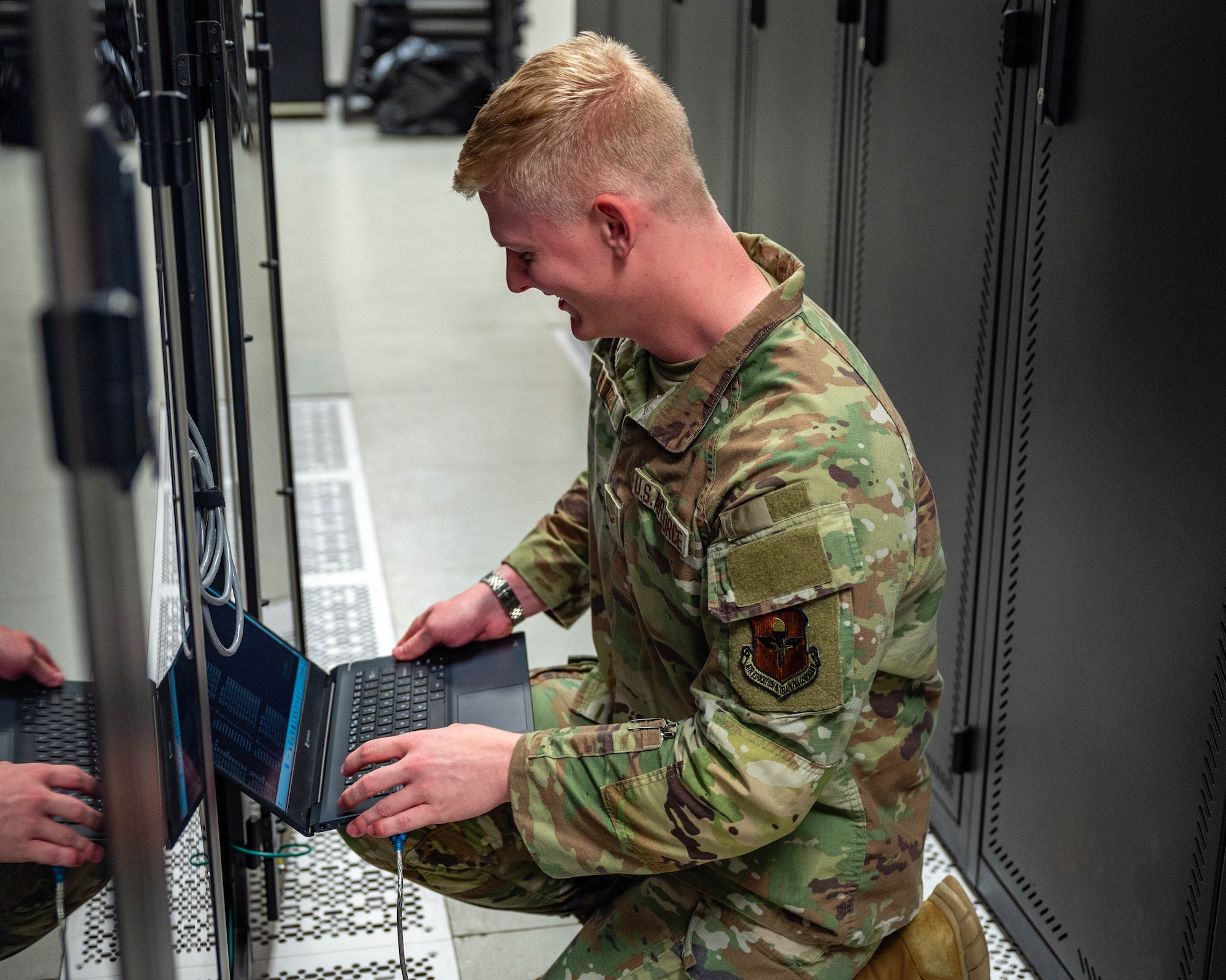 U.S. Air Force Airman 1st Class Dominic Puzzo, 56th Communications Squadron network systems operation technician, performs maintenance on a server, Oct. 1, 2025, at Luke Air Force Base, Arizona.